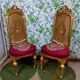 Pair of gilded chairs with Louis XV style floral pattern