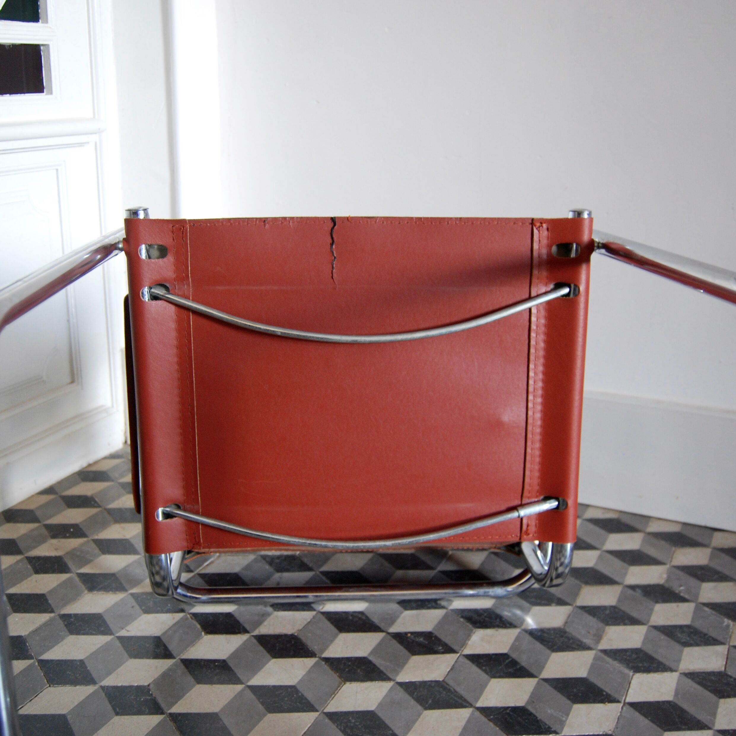 Vintage armchair in chrome and cognac leatherette