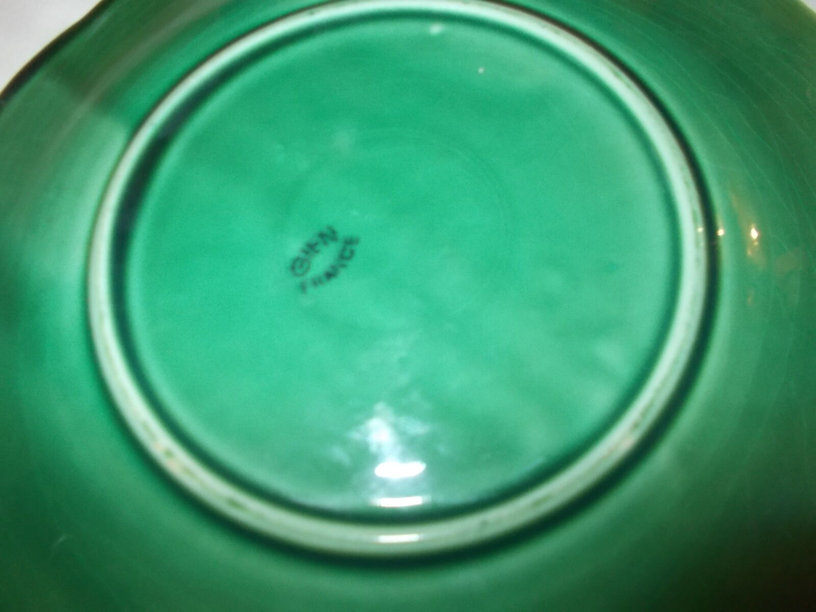 Bowl with green vine leaves