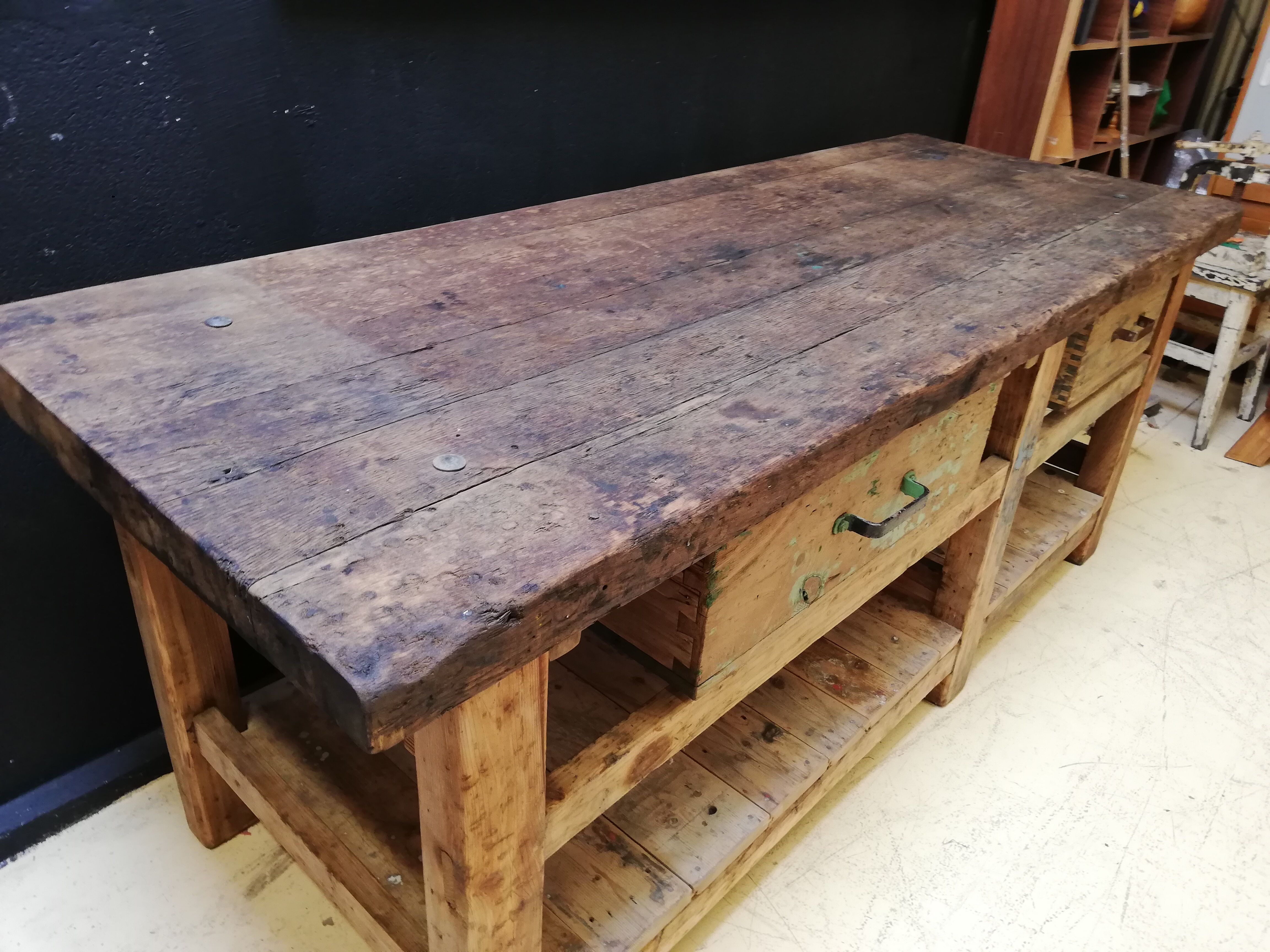 Old vintage wooden carpenter's workbench, industrial decoration