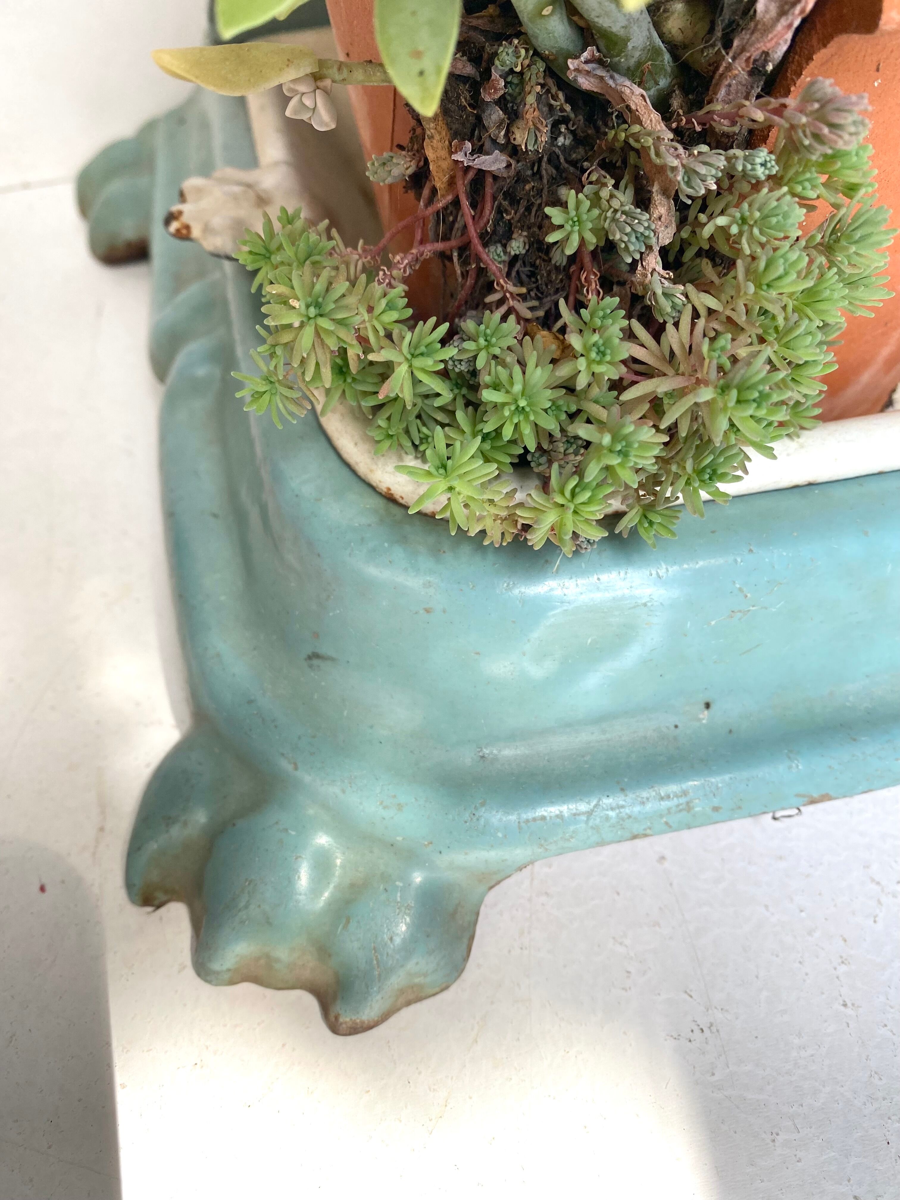 Enameled cast iron umbrella stand from the early 20th century