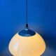 Beige acrylic glass mushroom pendant with a chrome top cap.