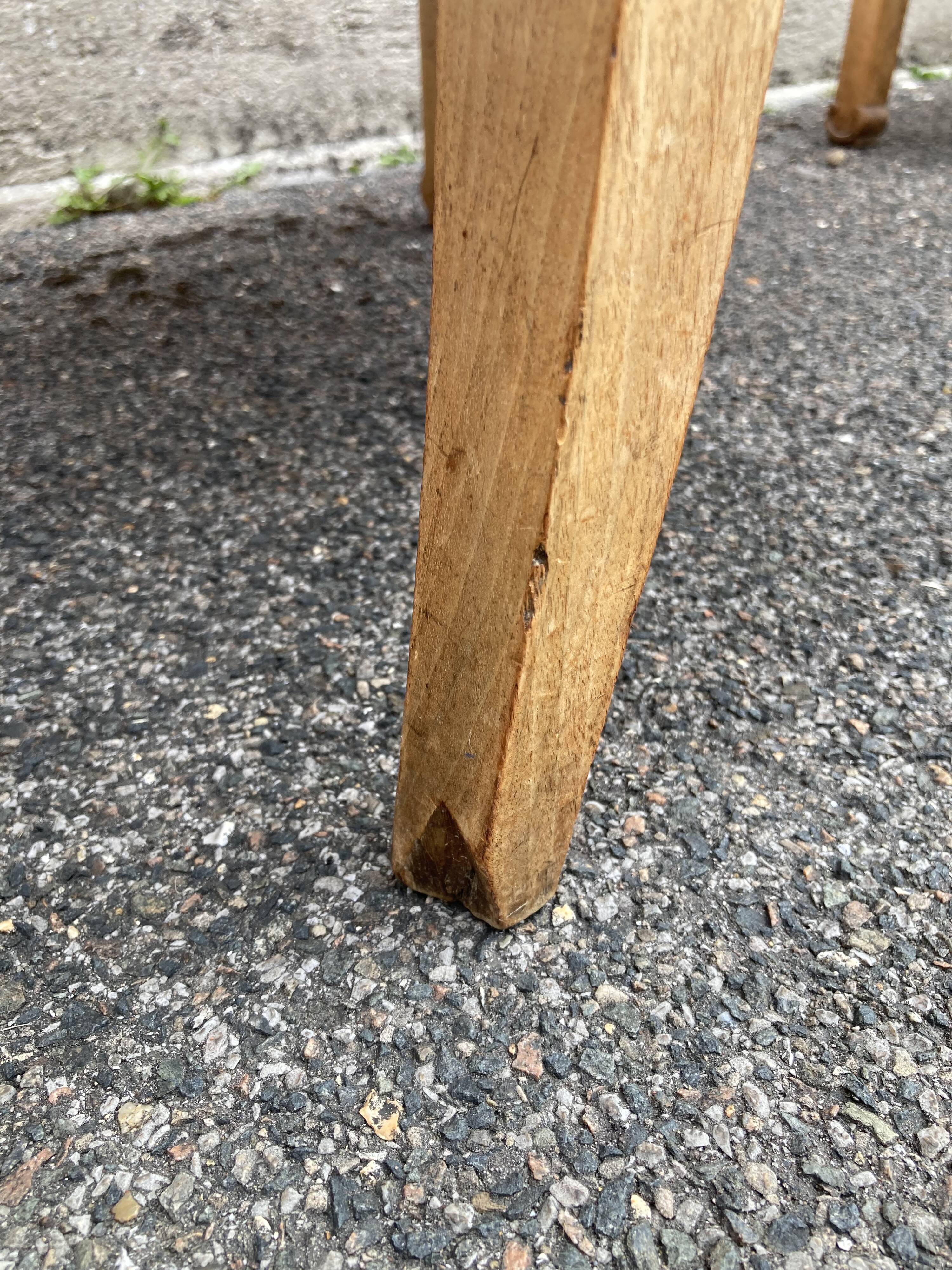 Set of four reupholstered Directoire period armchairs.