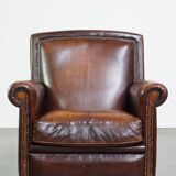 Vintage sheepskin armchair with beautiful warm colors and excellent seating comfort