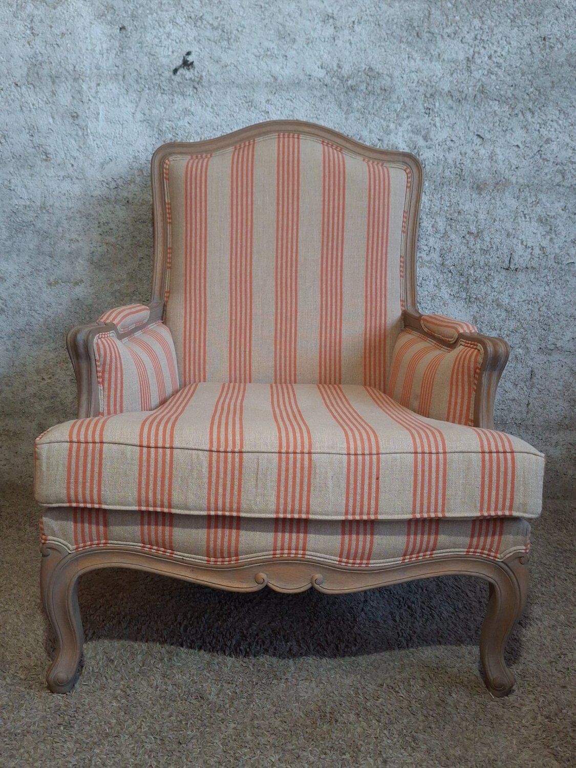 Louis XV bergère style, cerused, reupholstered in coral striped linen – Very good condition.