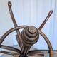 Vintage bentwood coat rack in Thonet style / Dark wood coat rack with shadow.