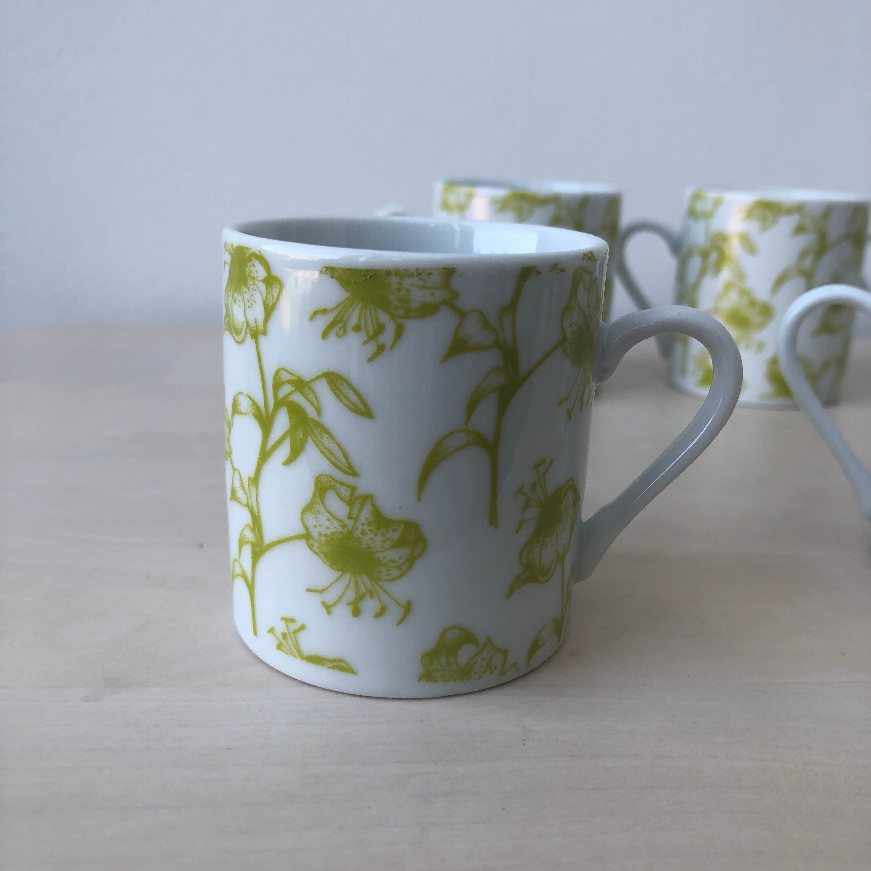 Porcelain coffee cups, green flower patterns