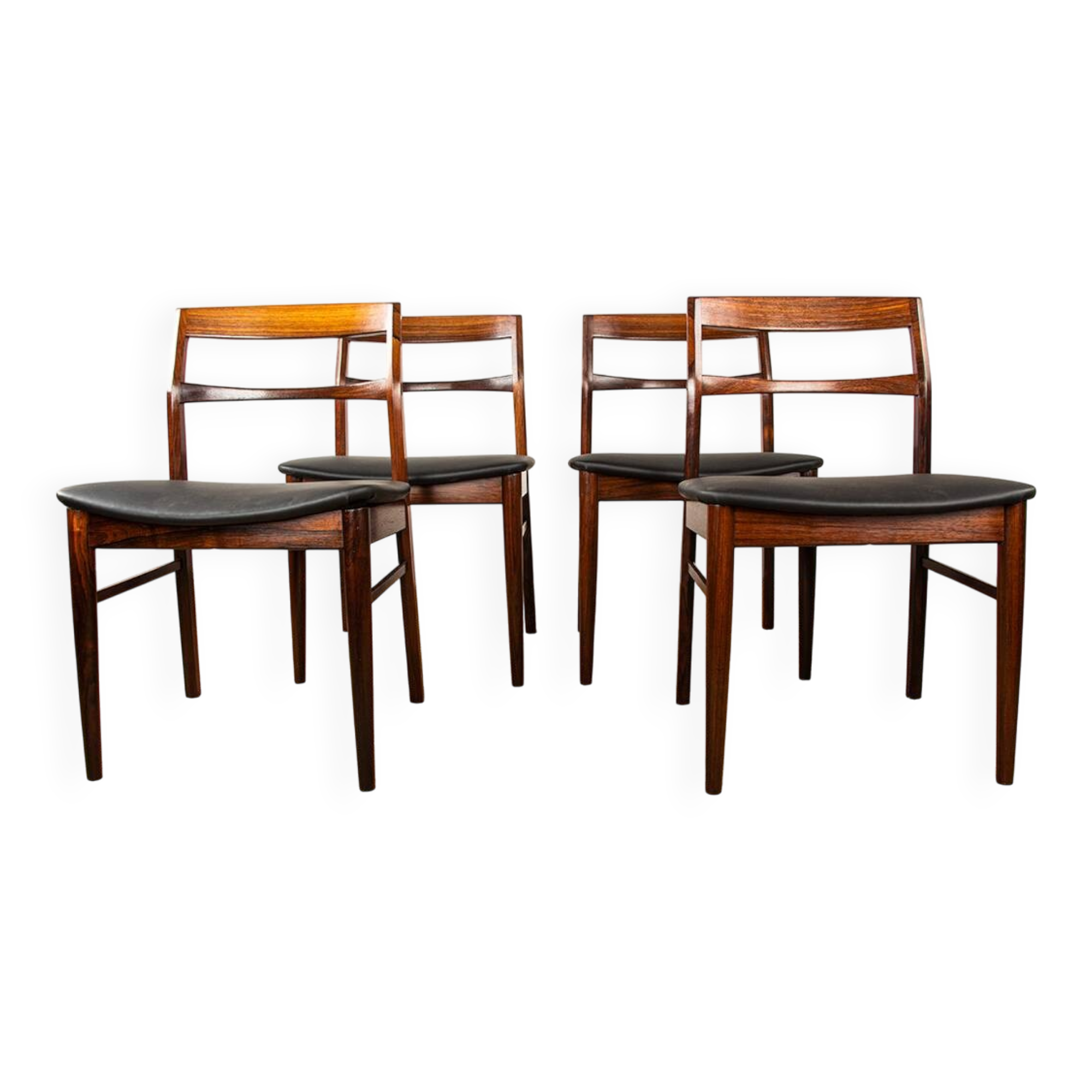 4 Danish chairs in rosewood and new leatherette by Henning Kjaernulf 1960.