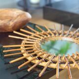1960s rattan sun mirror.