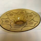 Yellow glass cup with flower pattern