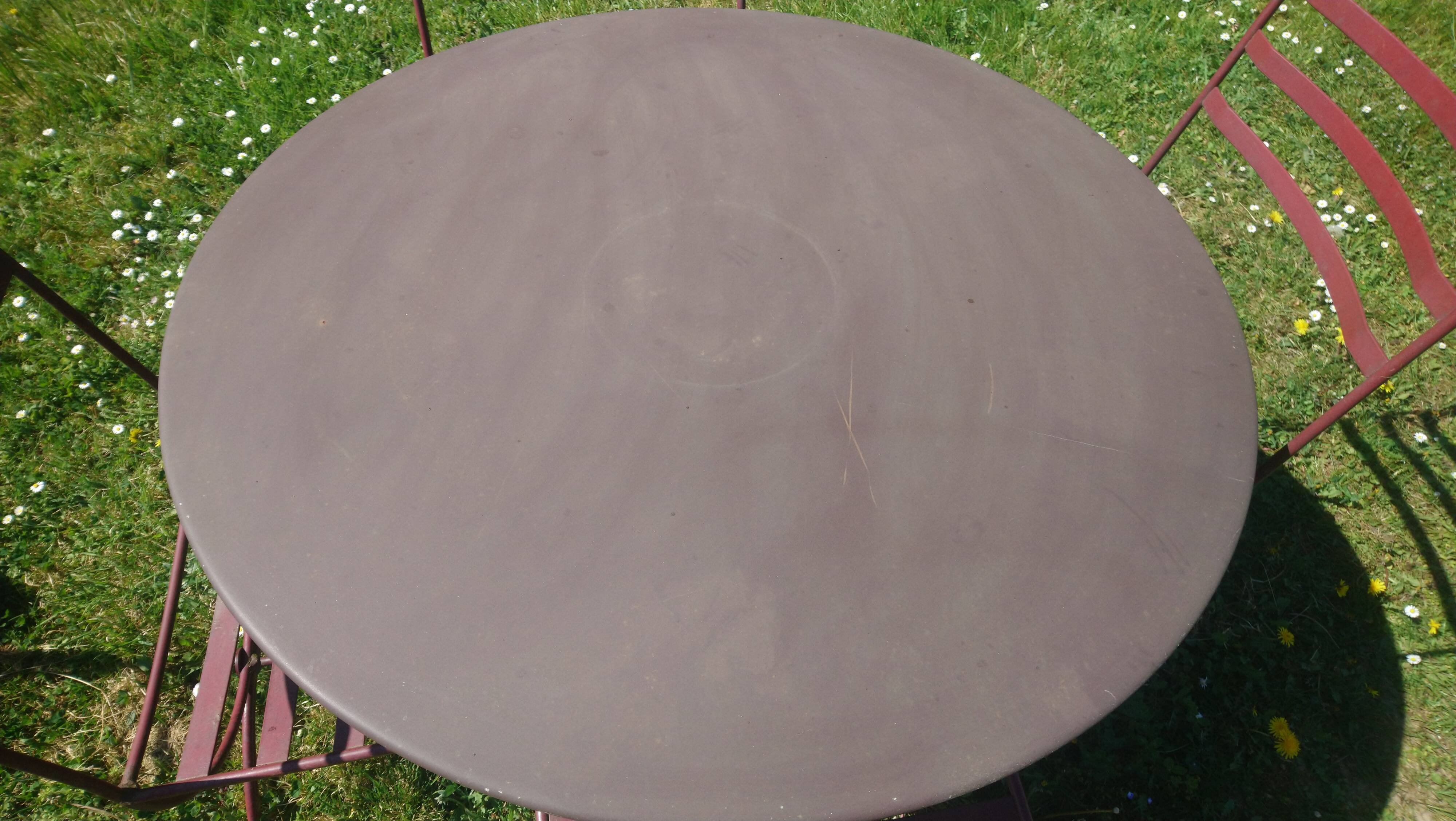 Garden table + 4 wrought iron chairs