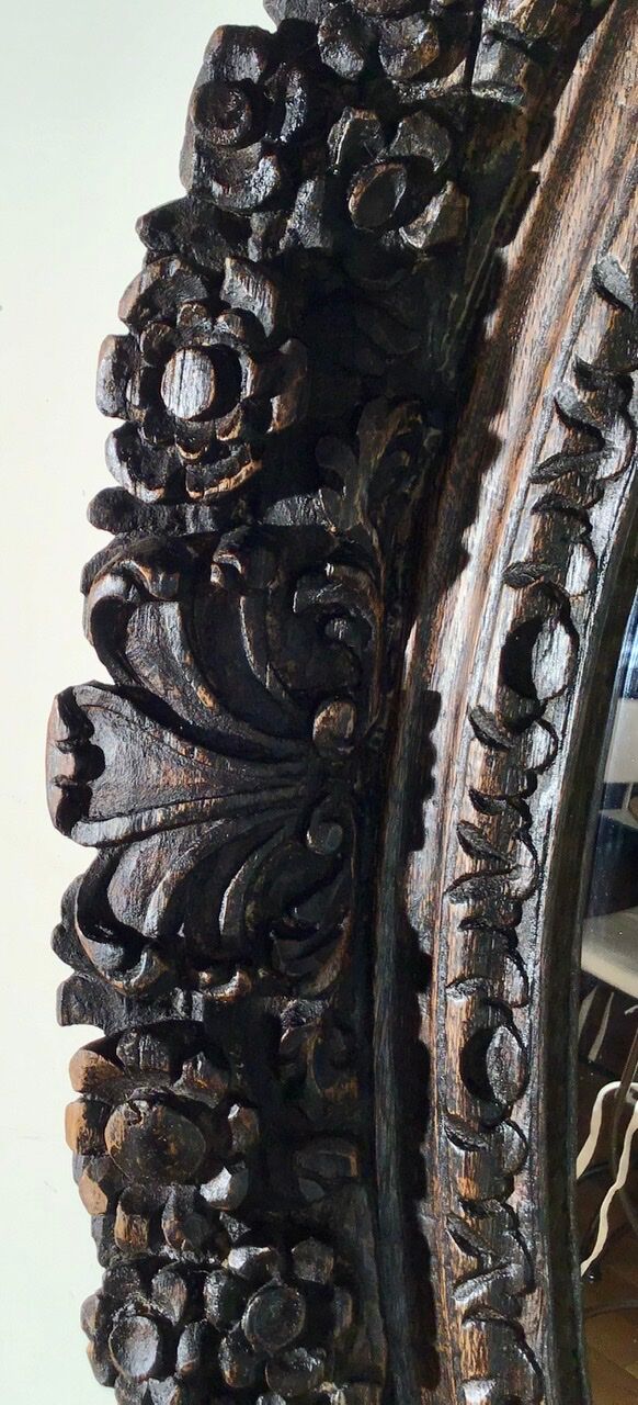 Oval mirror on an 18th century frame