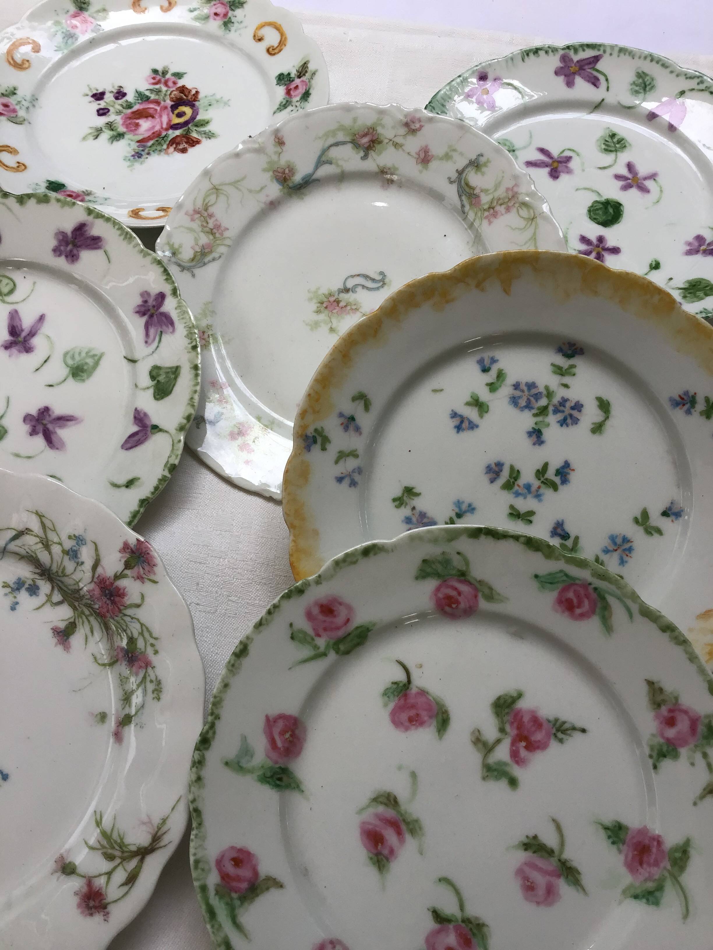 7 small plates in fine Limoges porcelain