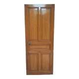 Old communication door with wood effect paint
