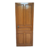 Old communication door with wood effect paint