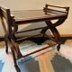 Teak service trolley with nesting table, mid-century modernism.