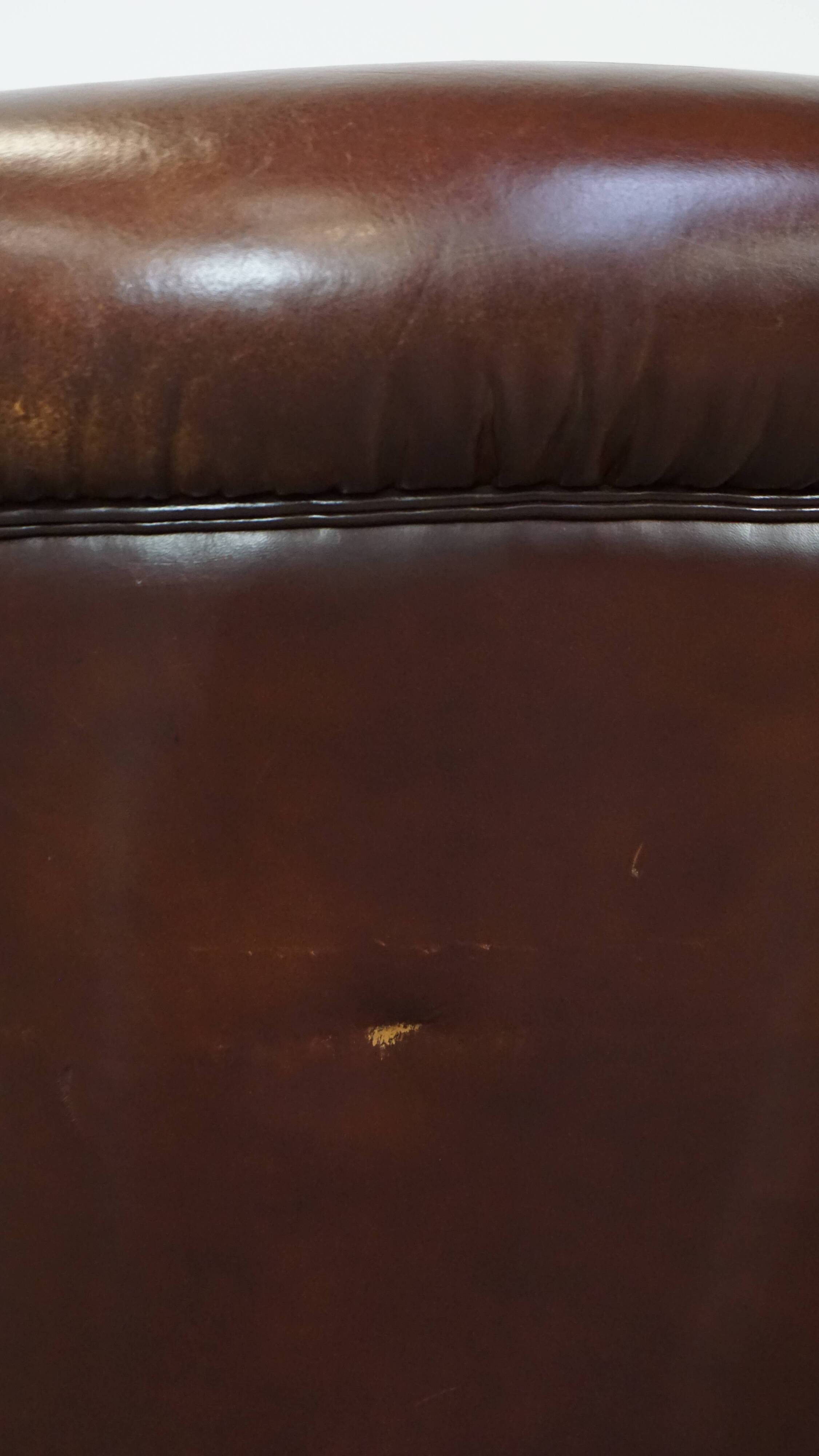Vintage club armchair made of sheep leather