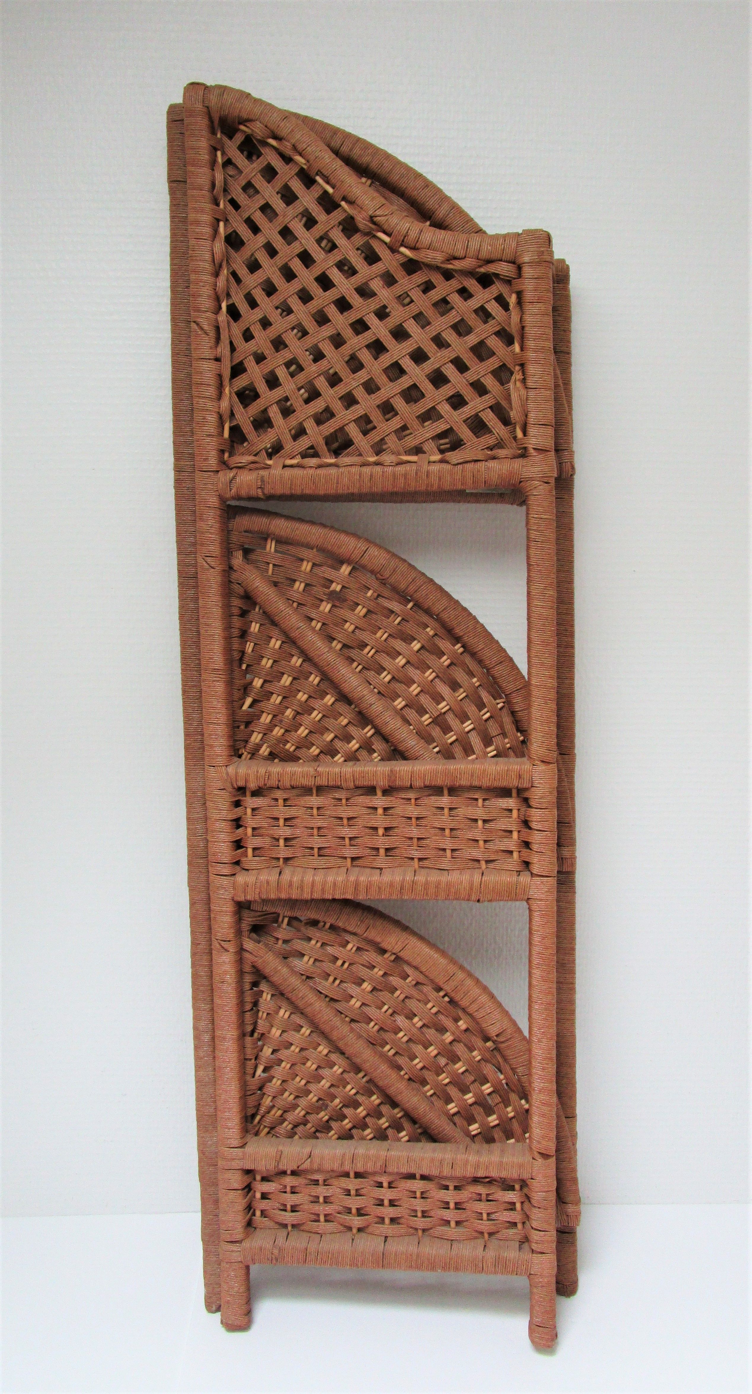 Corner shelf made of vintage braided natural fibers