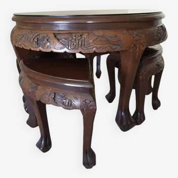 Carved coffee table and 4 built-in stools
