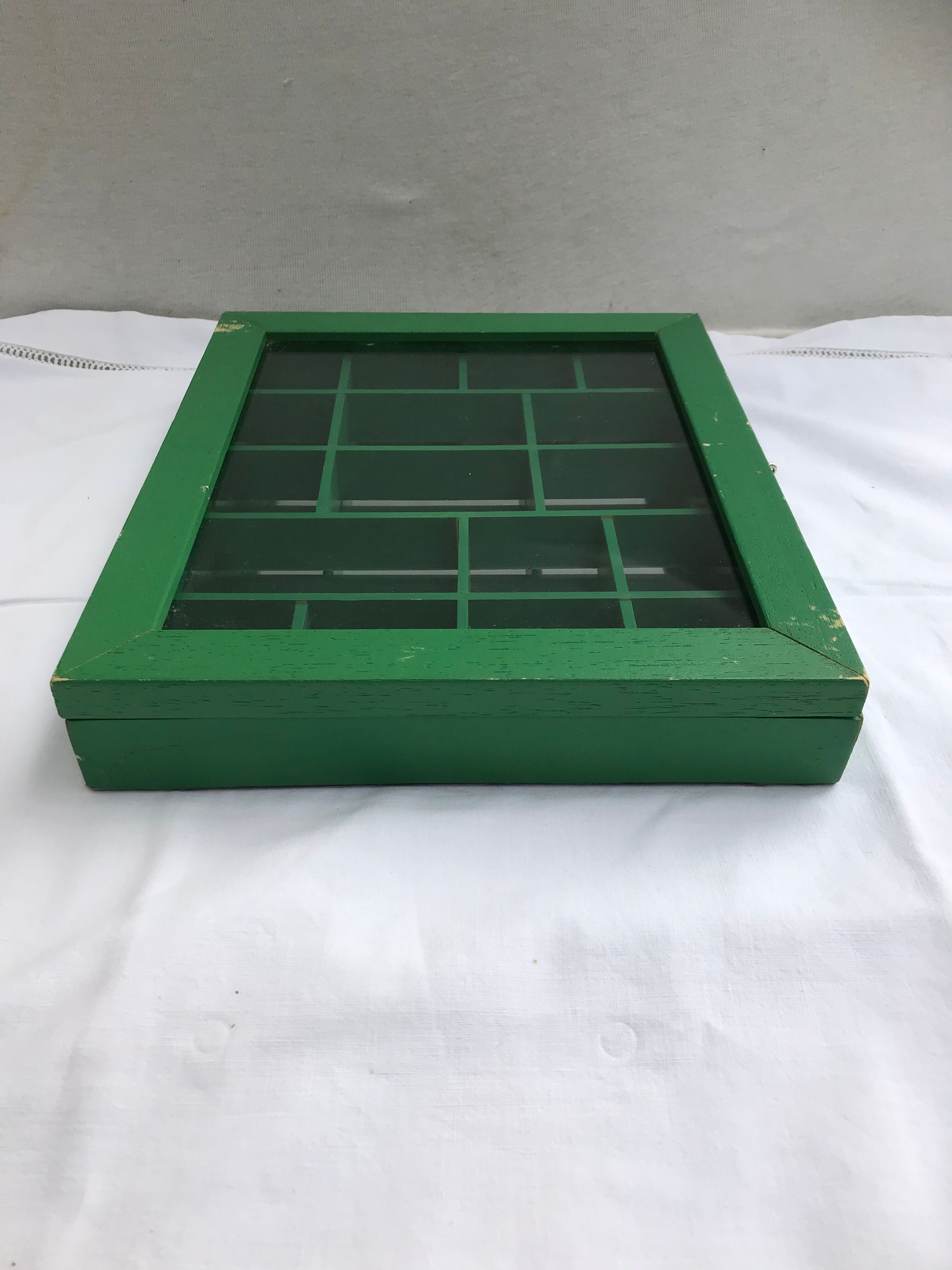 Old green wood showcase