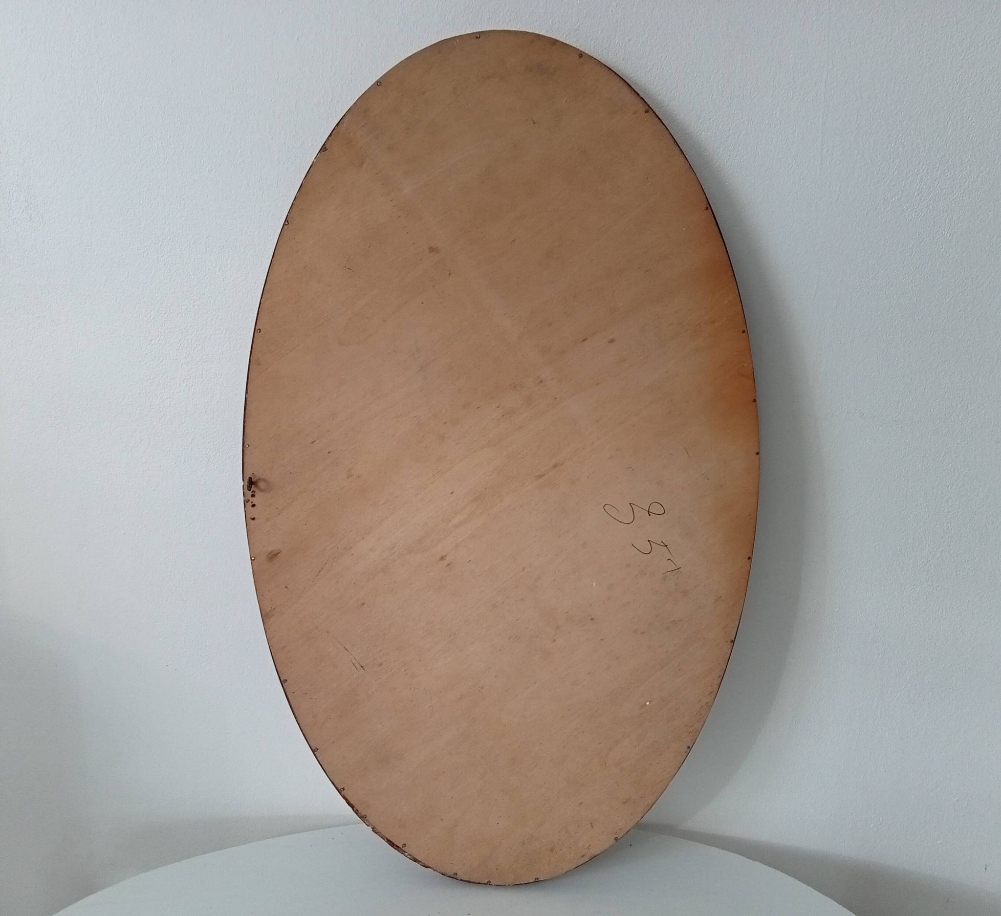 Antique oval mirror with bevelled glass