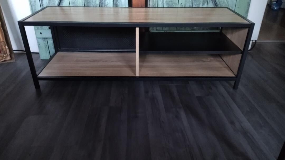 Industrial tv cabinet in metal and wood.