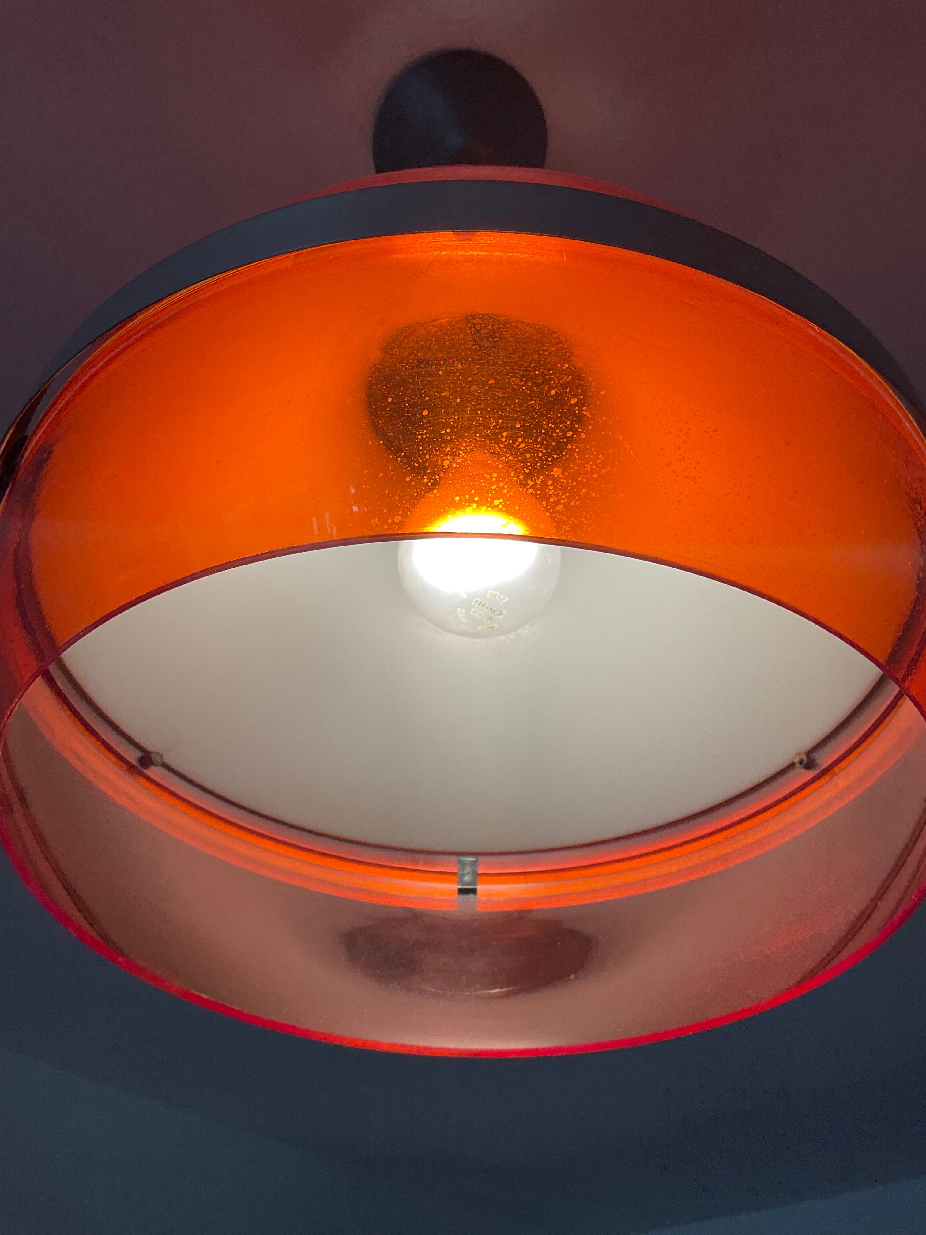 Space age pendant lamp in orange plexiglass and chromed metal