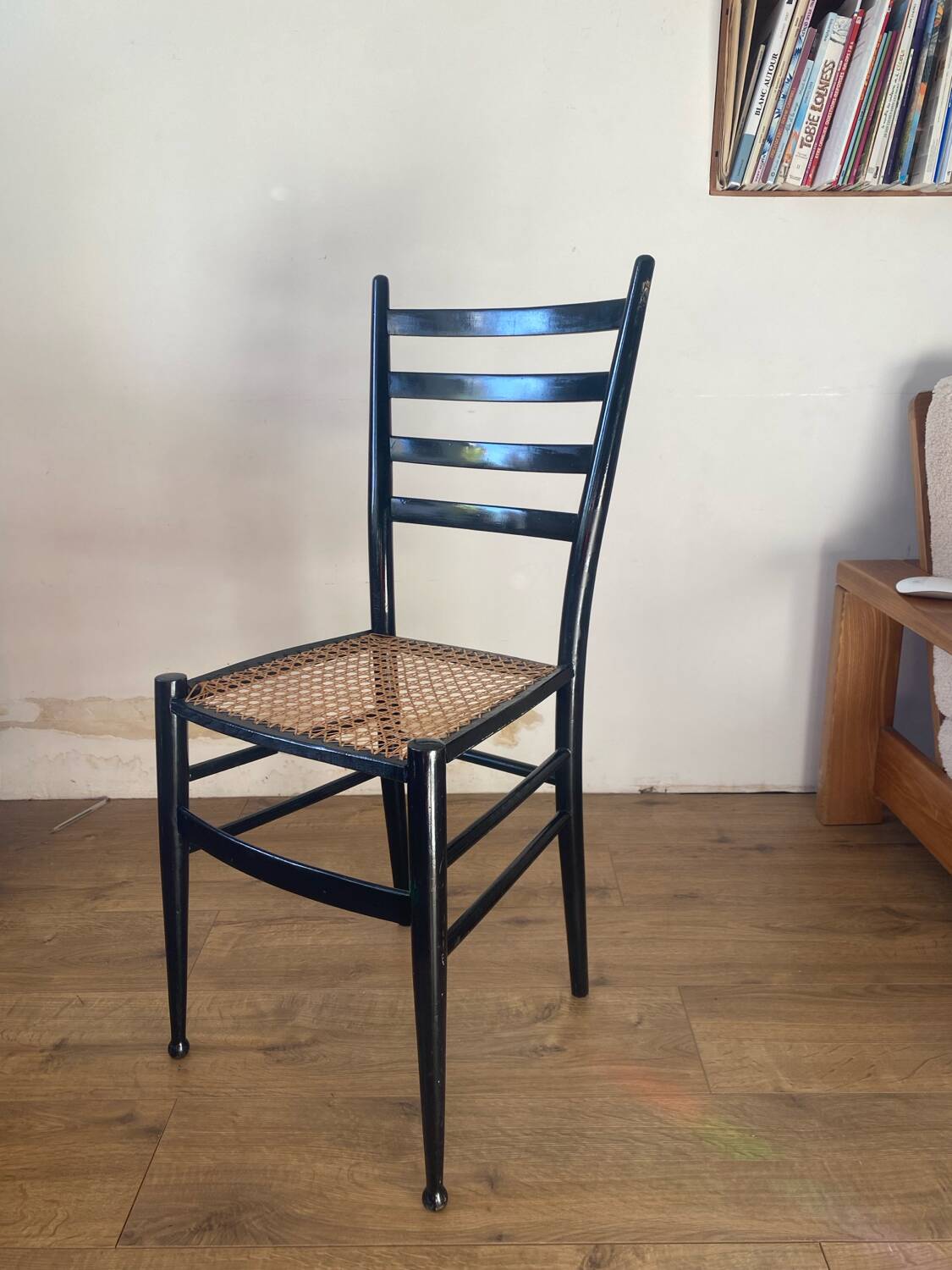 Light wooden chair with caning