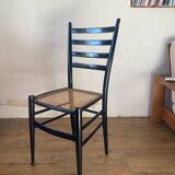 Light wooden chair with caning
