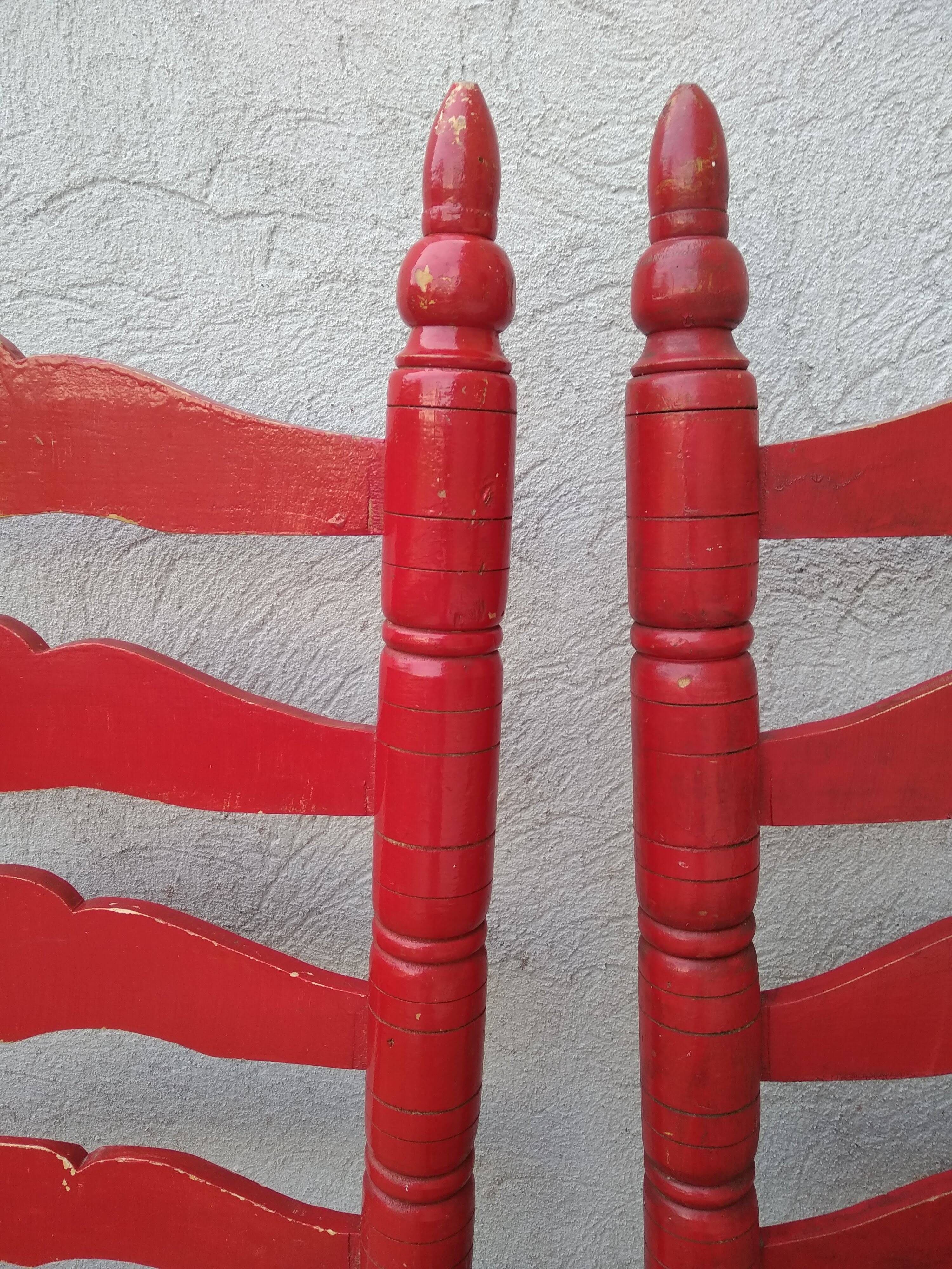 2 vintage red straw chairs