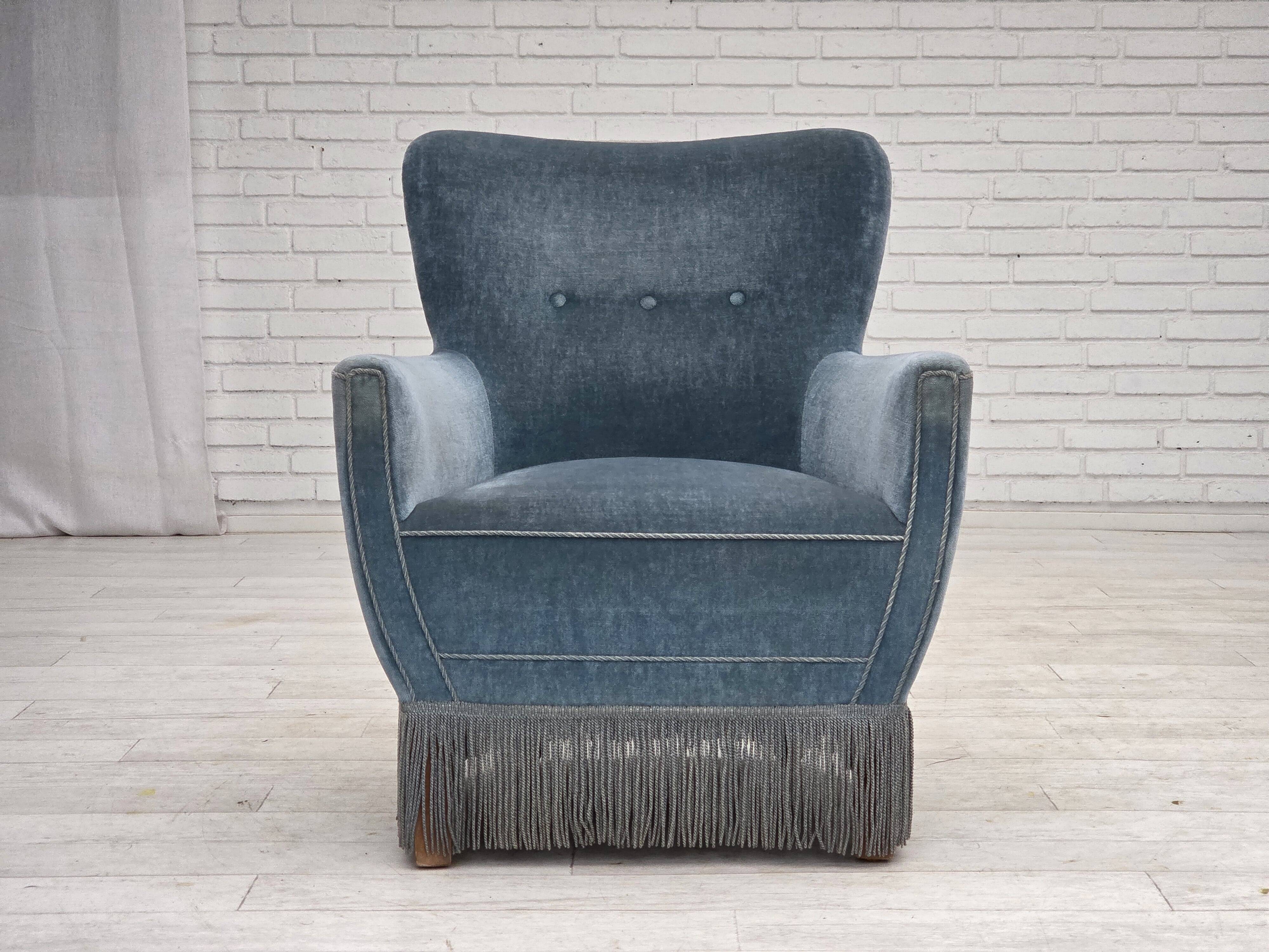 1970s, Danish armchair with footstool, blue furniture velour, oak wood legs