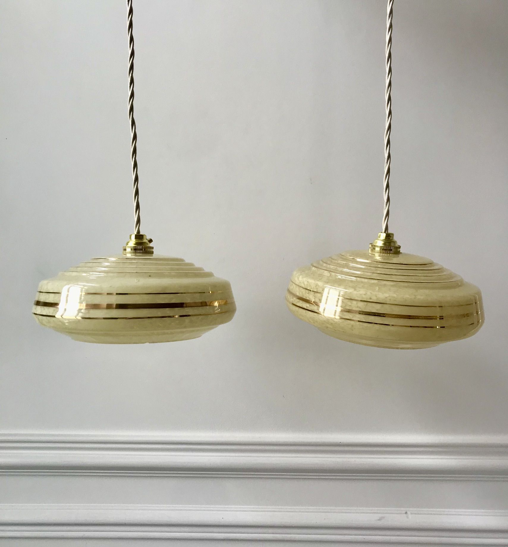 Pair of suspensions in yellow Clichy glass and golden border 40s-50s