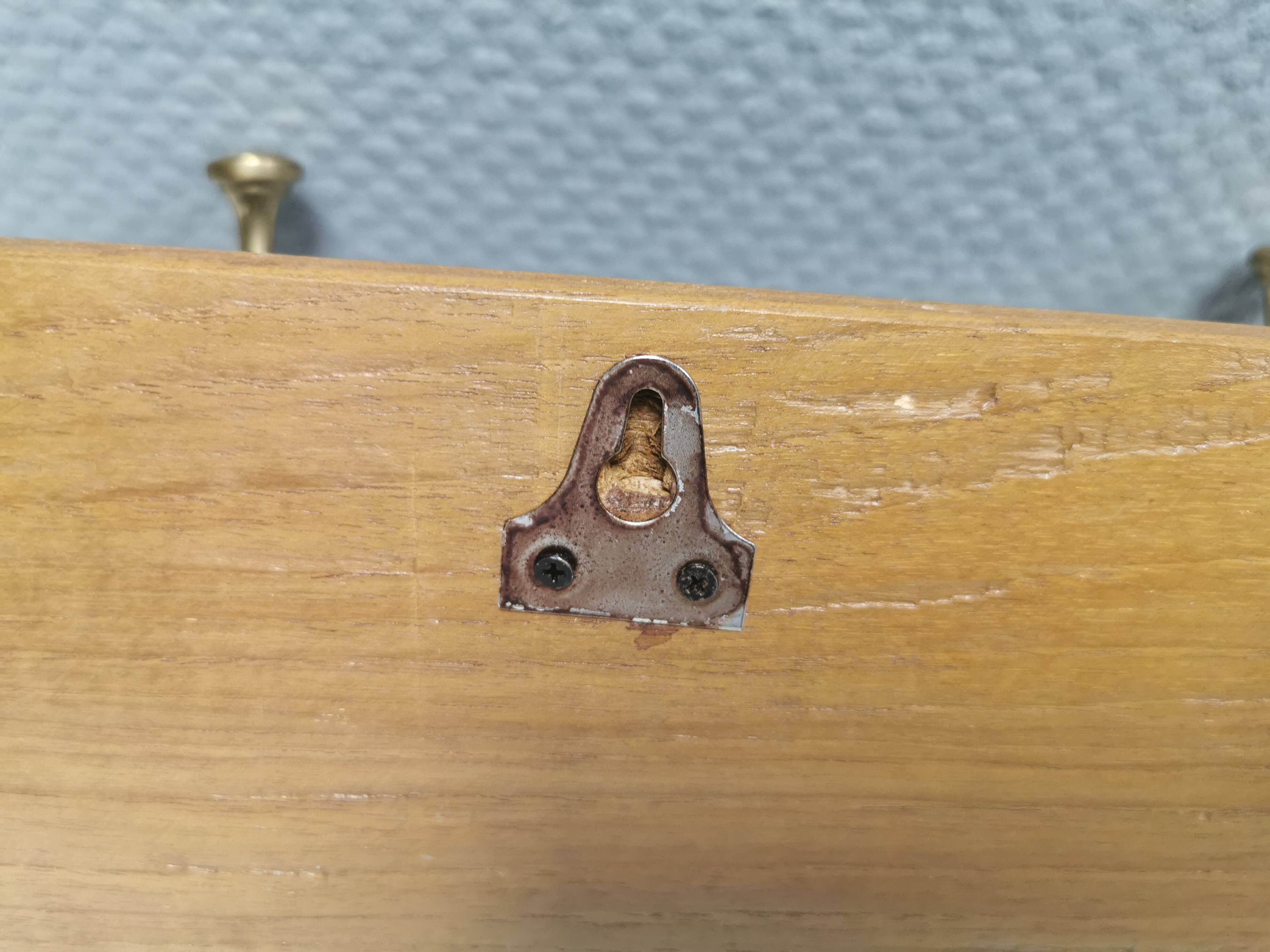 Coat rack in teak and brass. Denmark 1970-80s