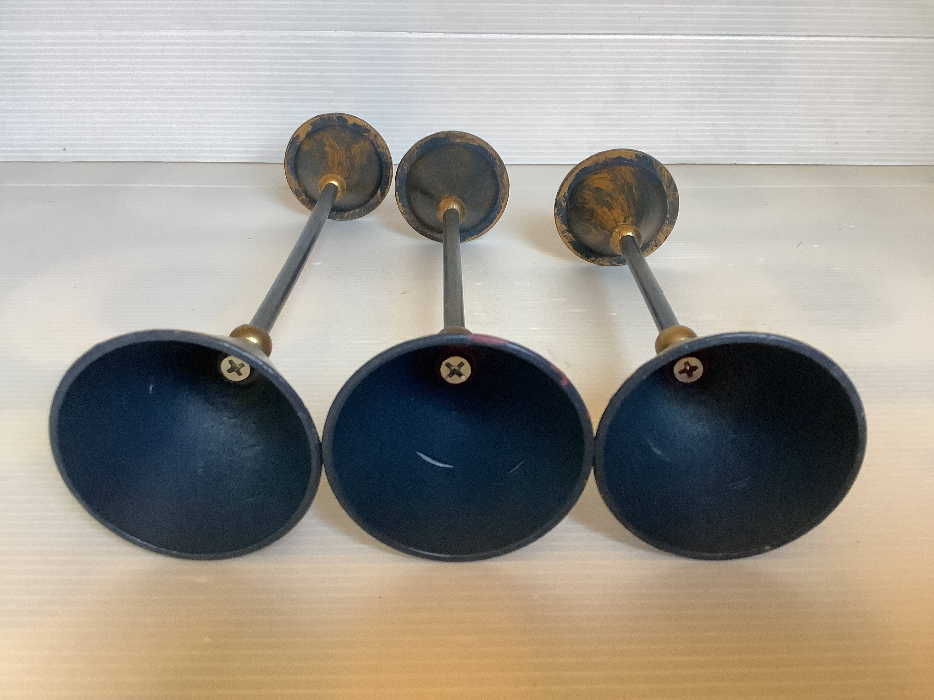 Trio of vintage blue and gold candlesticks