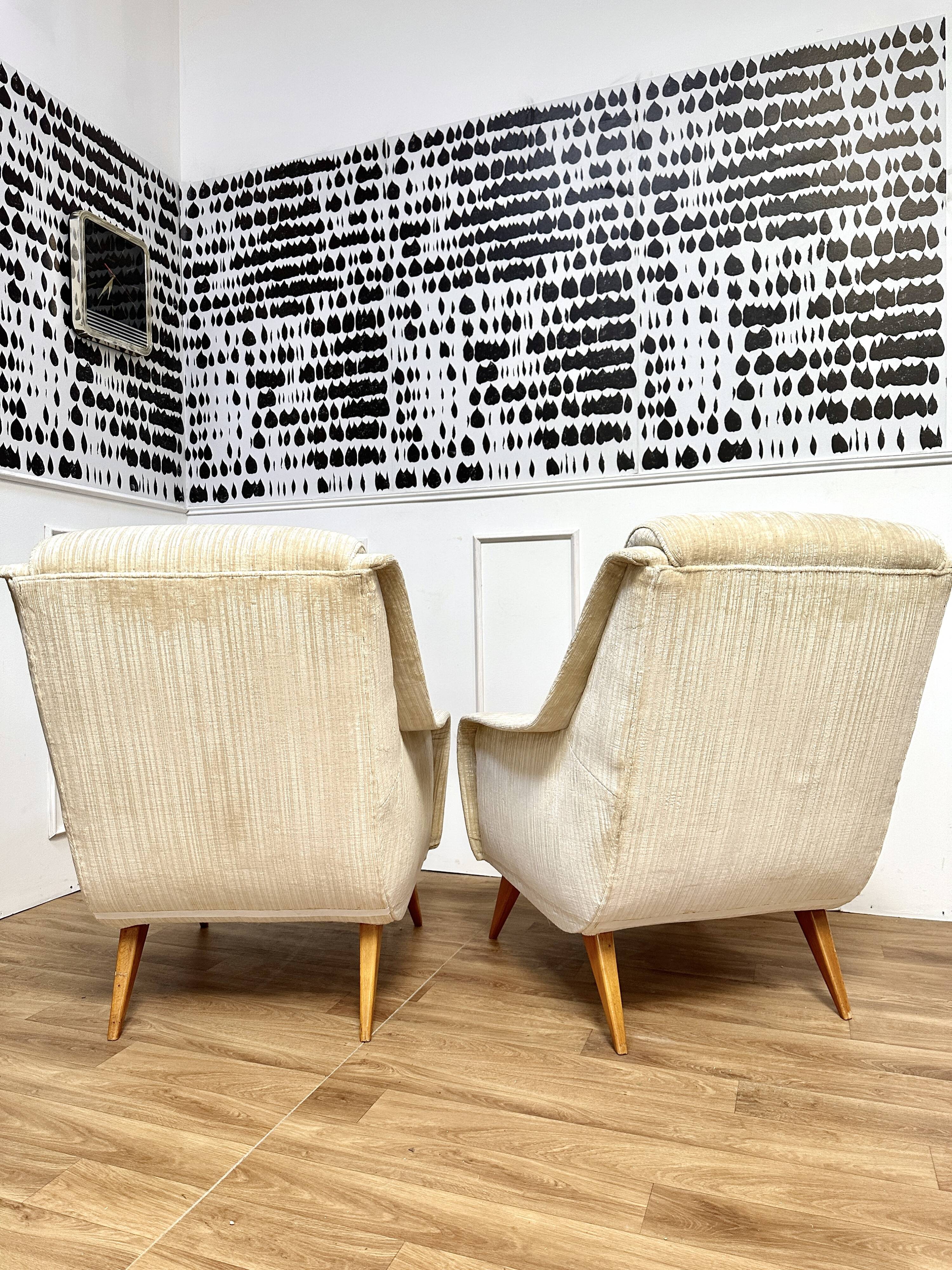 Pair of compass feet chairs