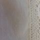 Linen sheet bordered by a wide lace and between two of lace