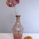 Blown glass vase moves purple