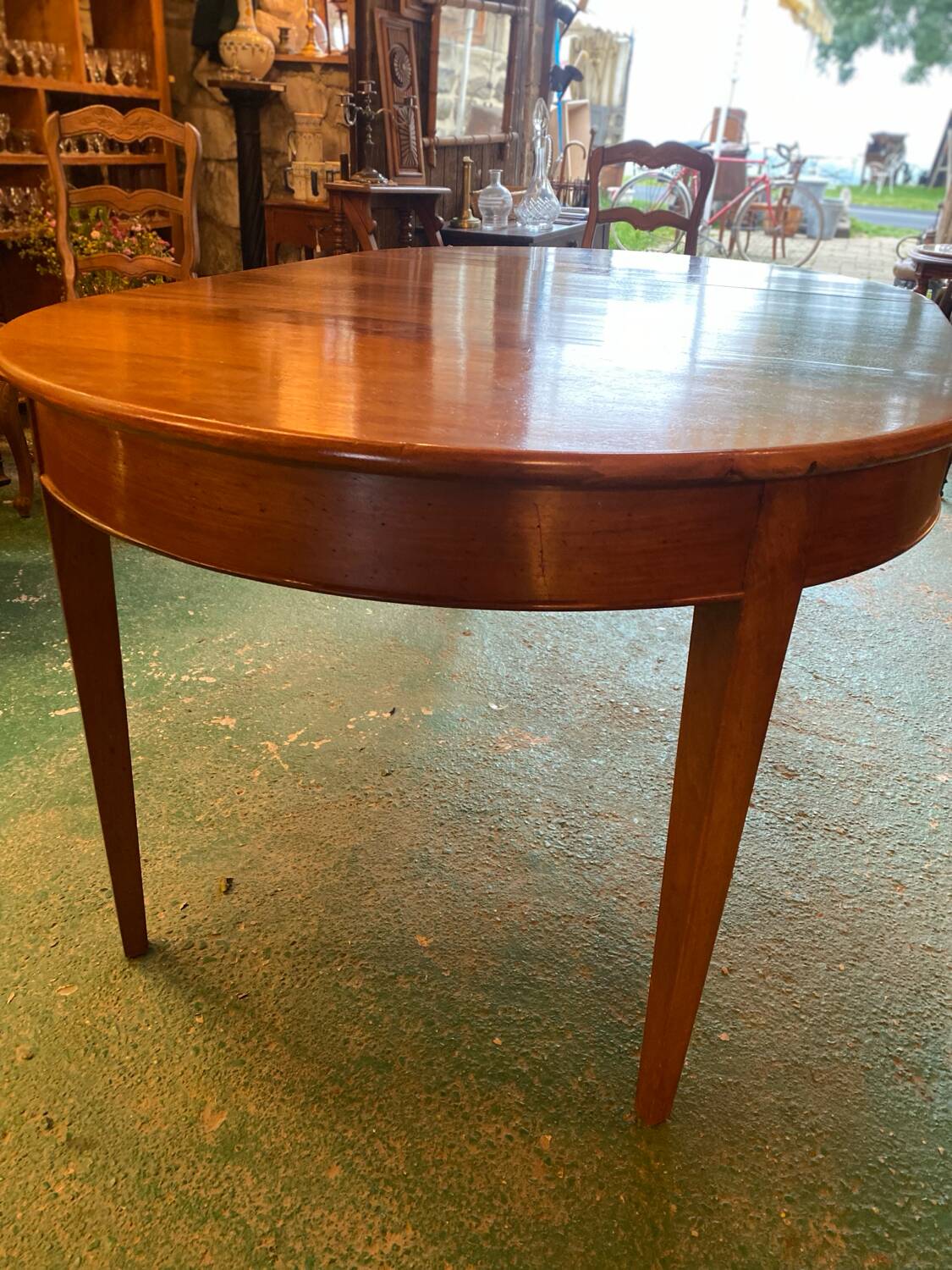 Louis XVI style oval walnut extendable table