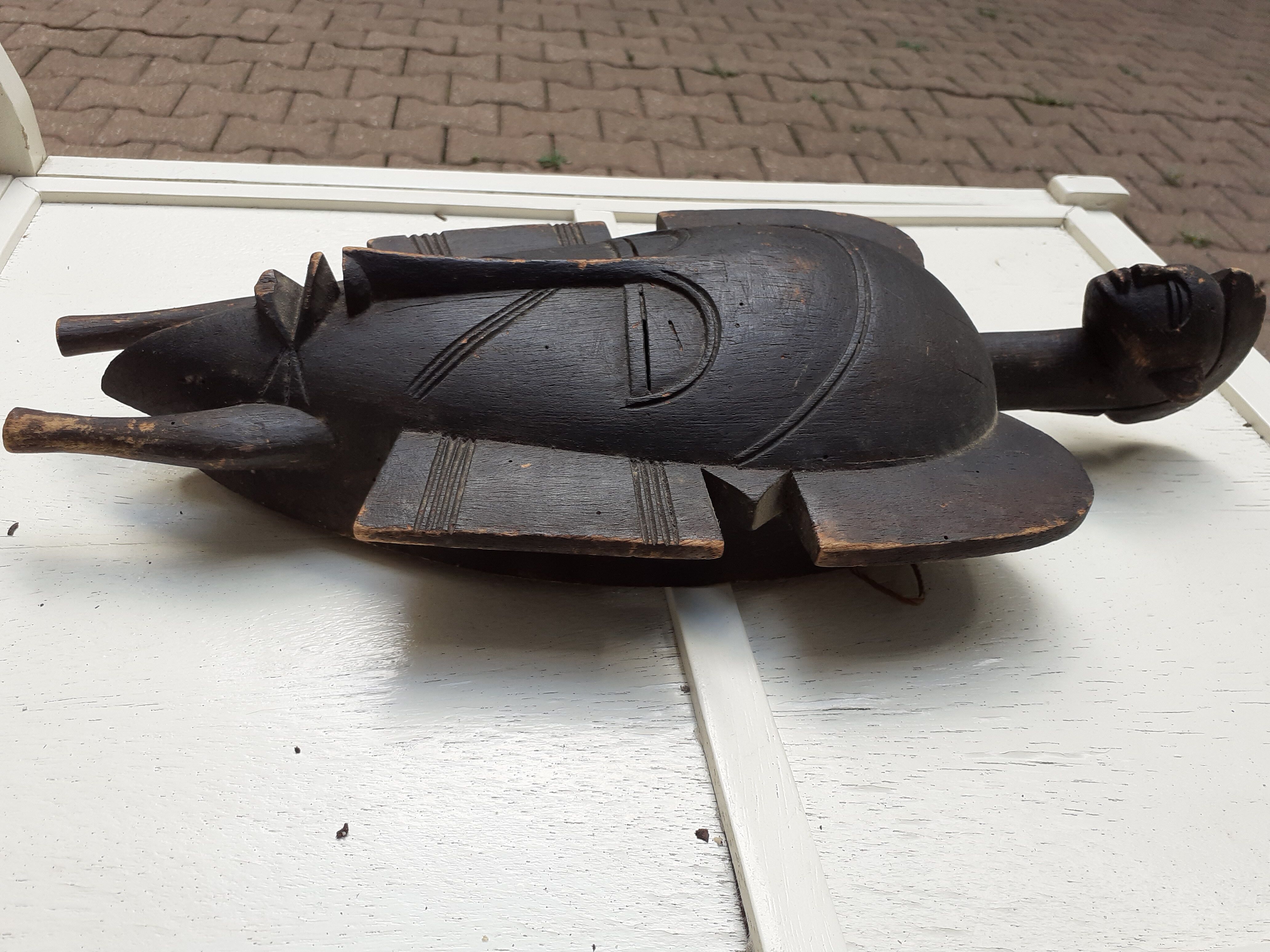 African mask with head