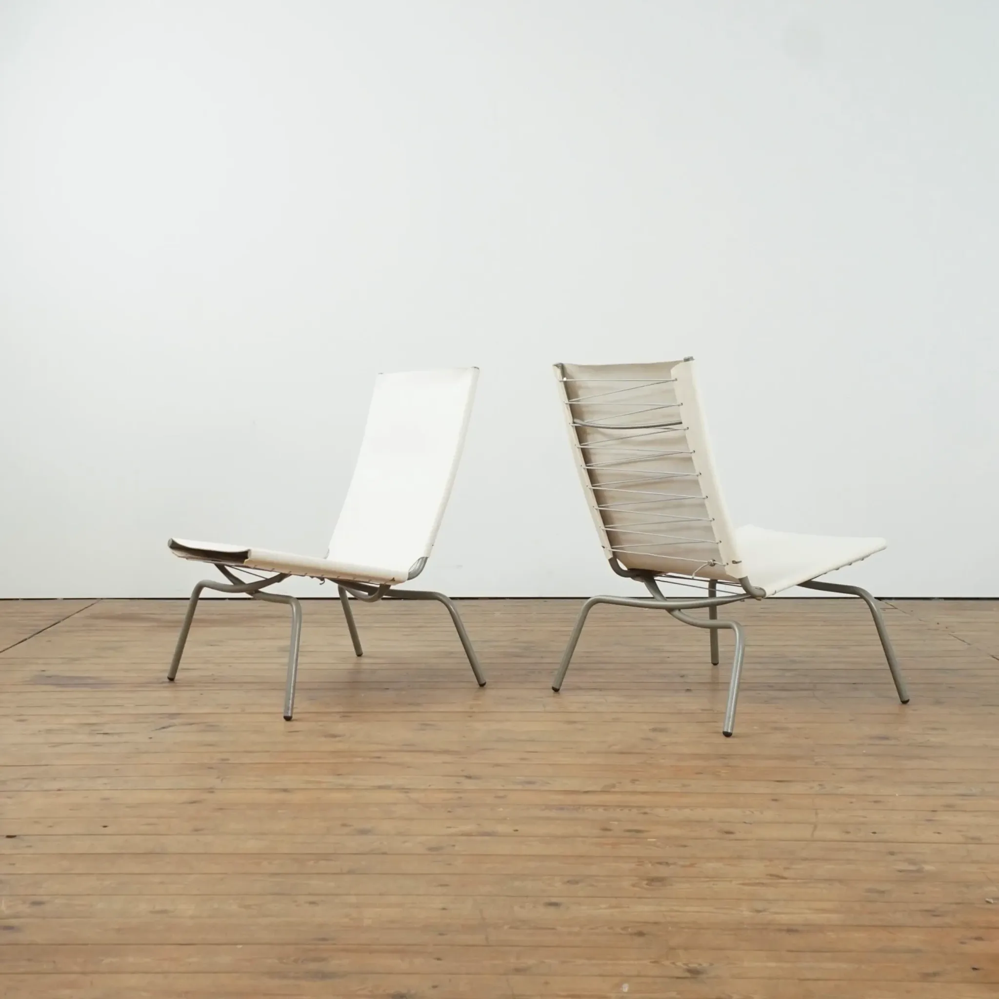 Set of 2 Crossed Legged lounge chairs by Fabiaan van Severen.