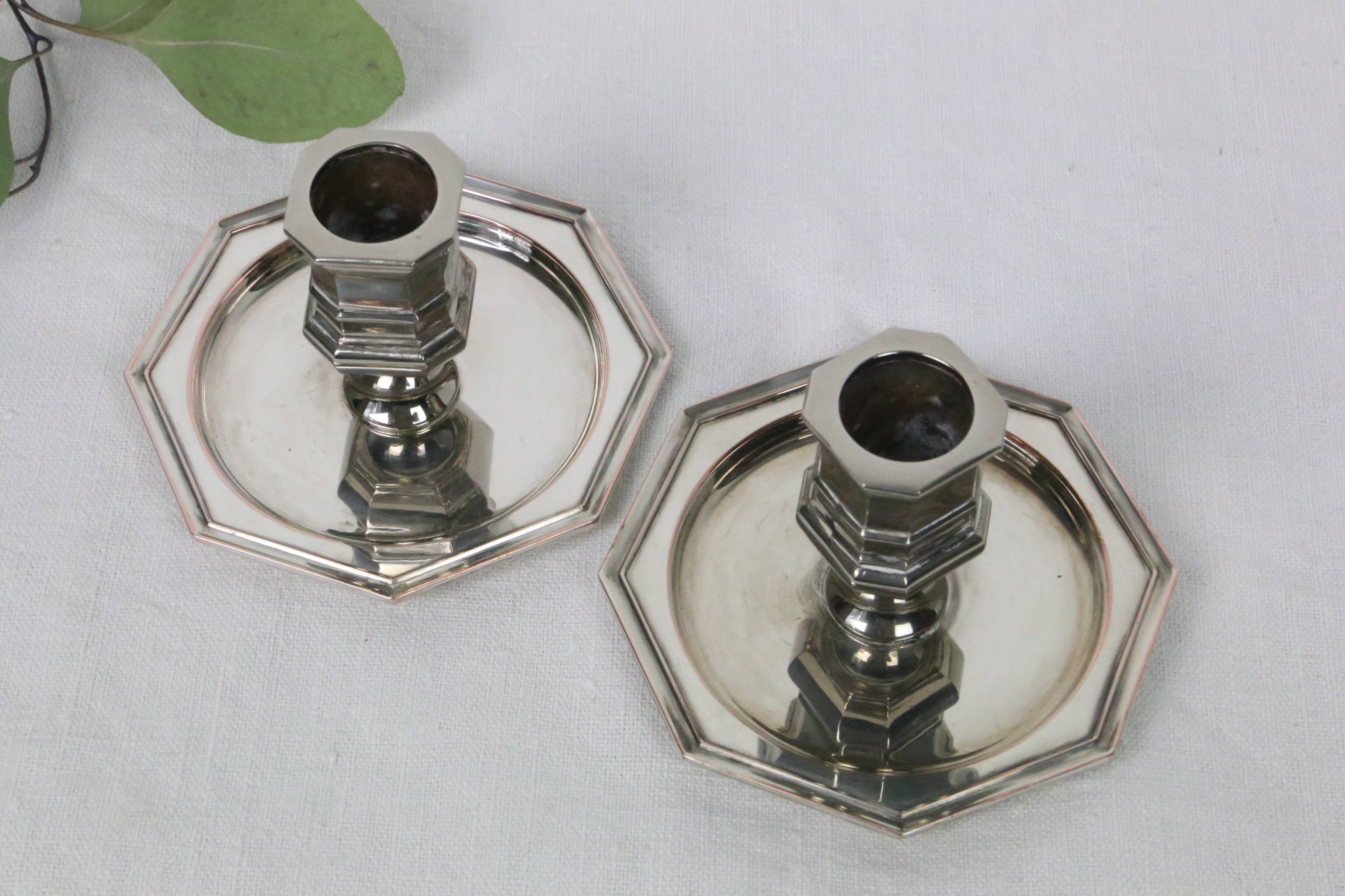 Pair of silver-plated metal candlesticks