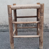 Vintage handmade wooden stool and rope