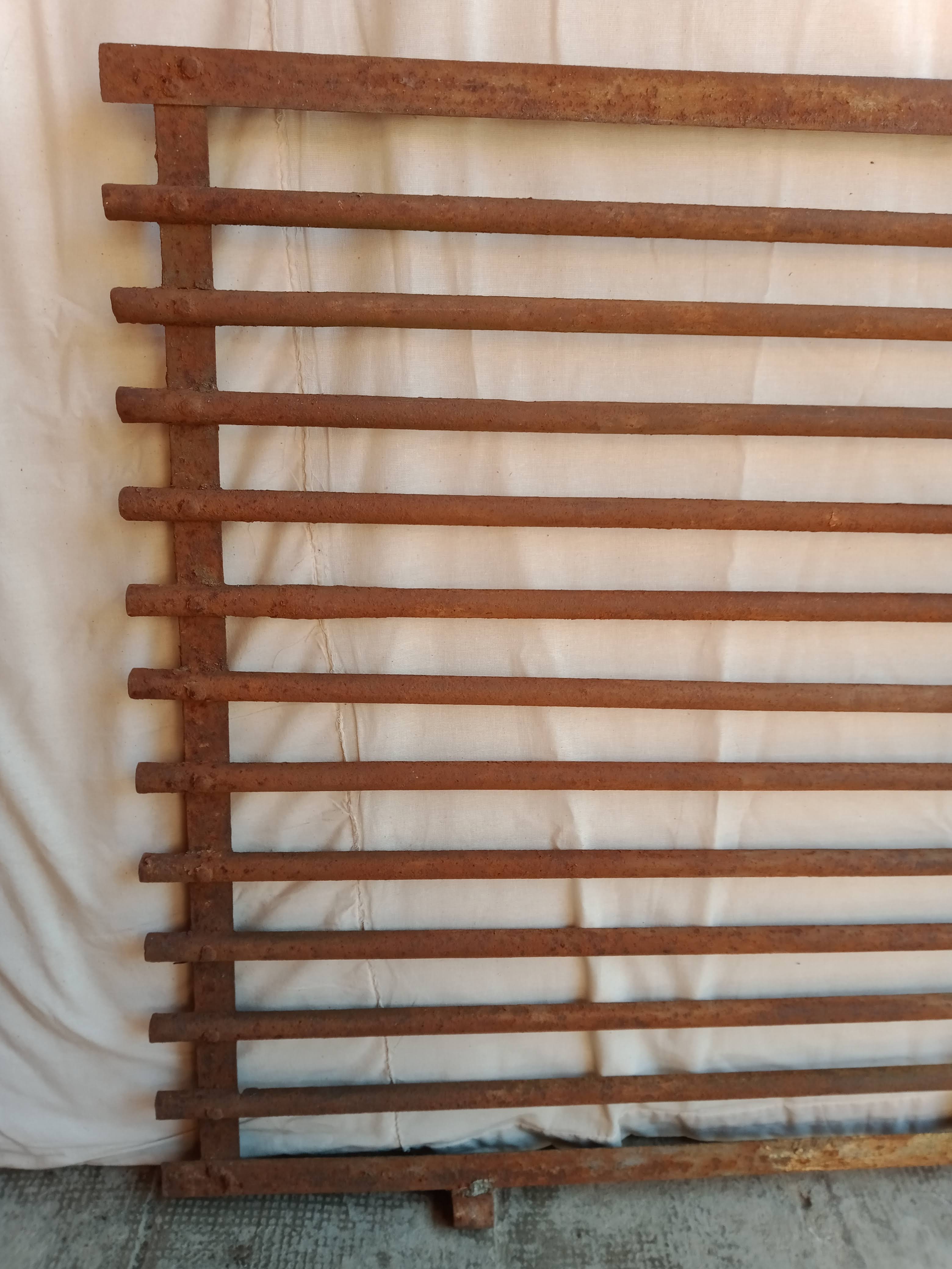 Old riveted metal gate