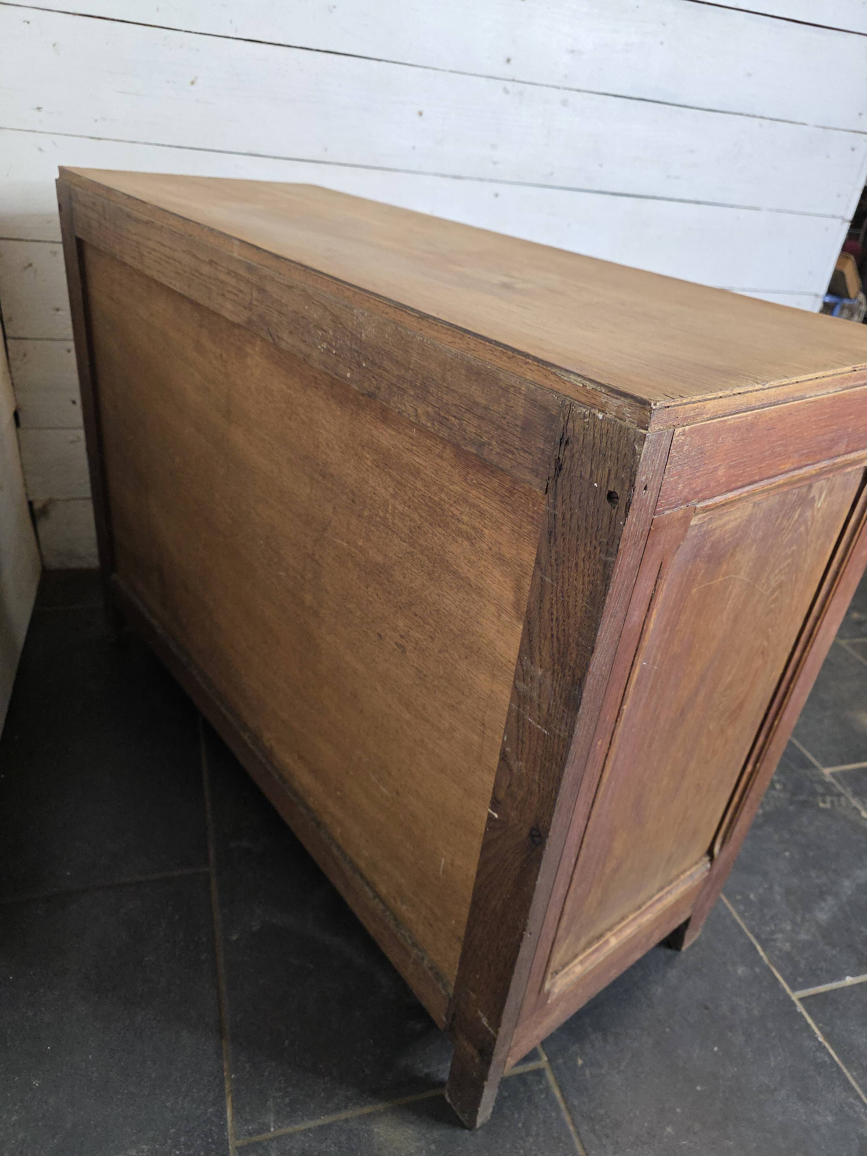 Antique oak sideboard with sliding doors