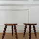 Pair of twisted wooden tripod stools