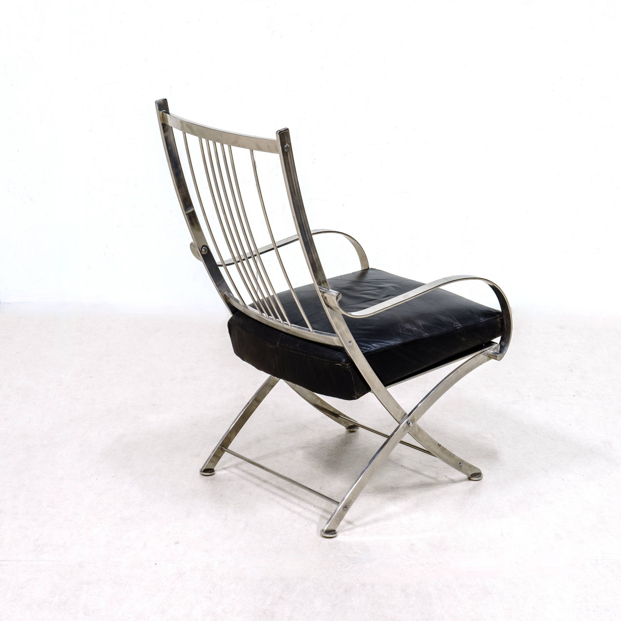 Henri Pouenat fauteuil et ottoman "Schneider "