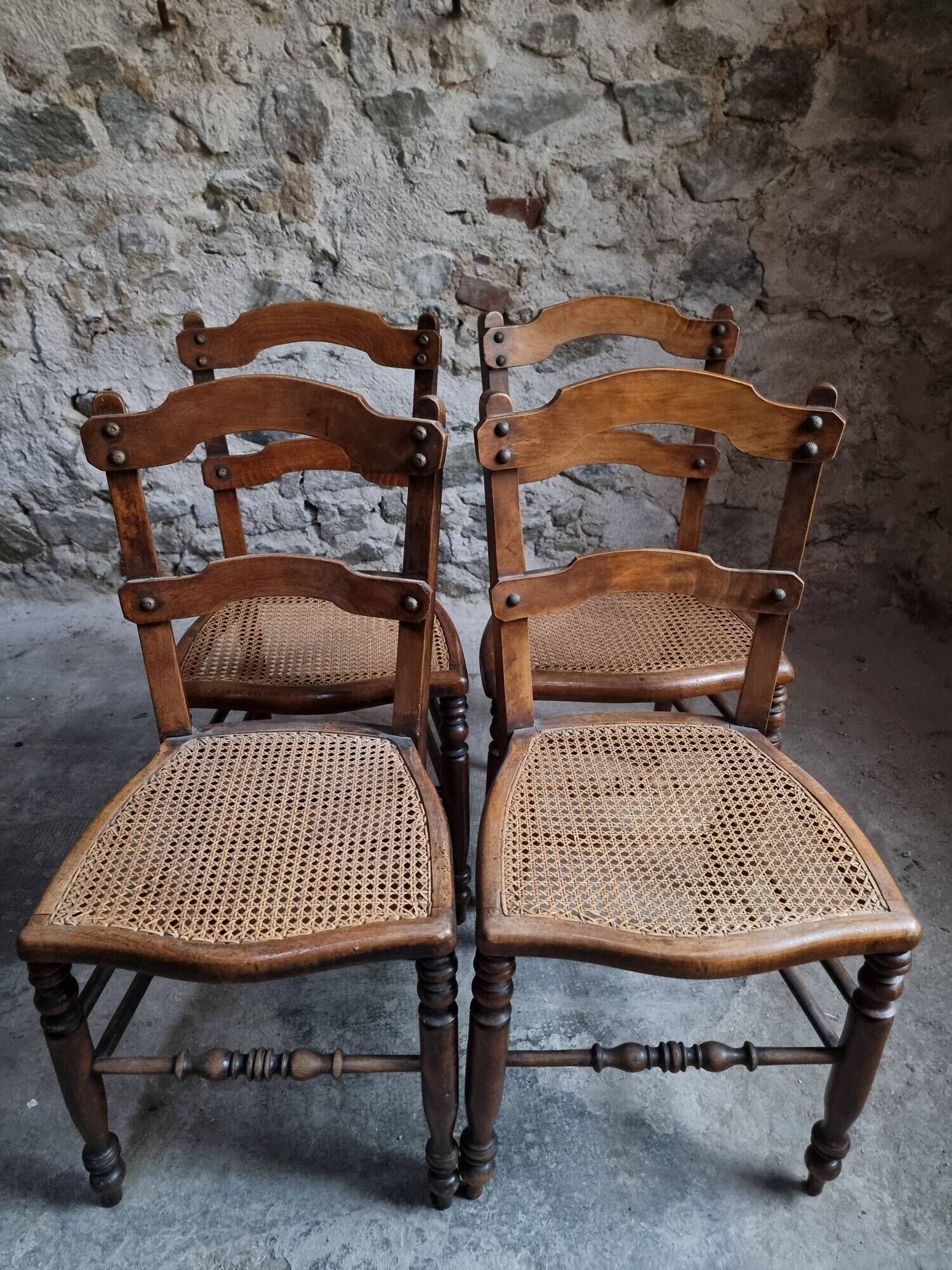 Set of 4 antique dining chairs with caned seats, beech, France, circa 1900–1920.