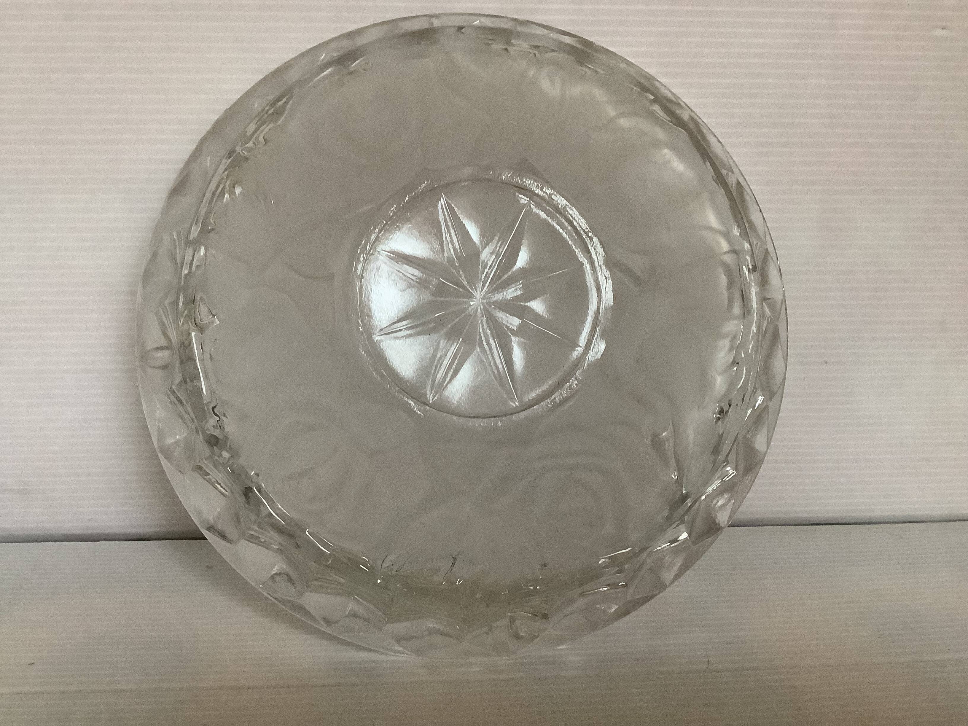 Large glass ashtray with frosted flowers.