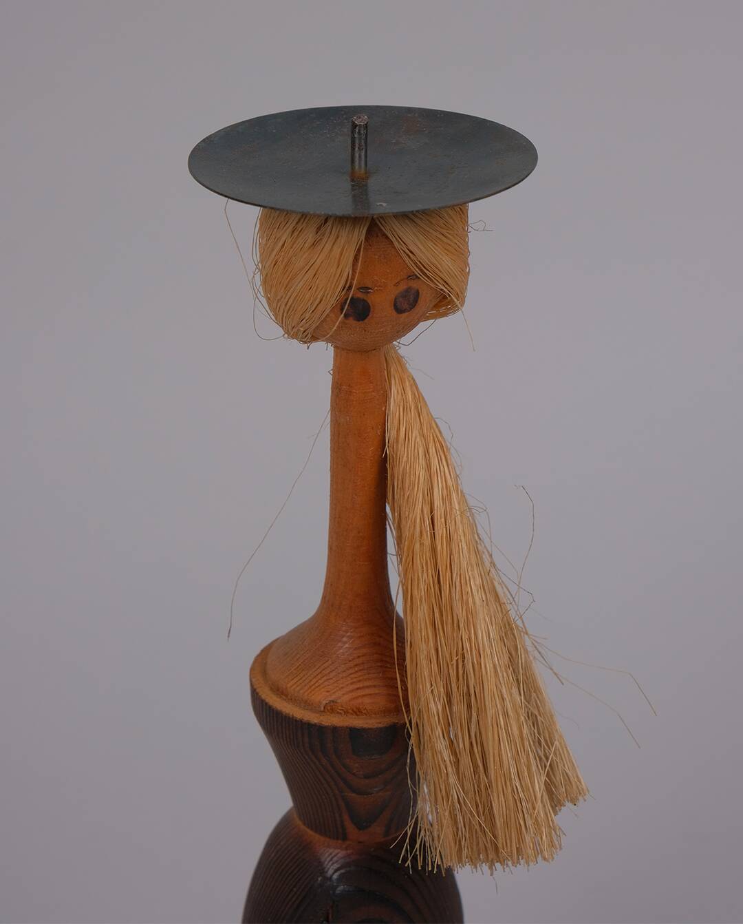 Anthropomorphic wooden candle holder