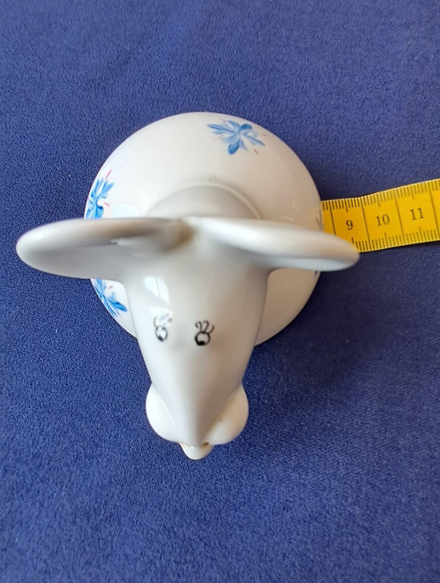 Salt cellar or porcelain salt shaker. Zoomorphic figurine of a mouse.